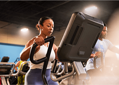 eos gym member working out on a cardio machine